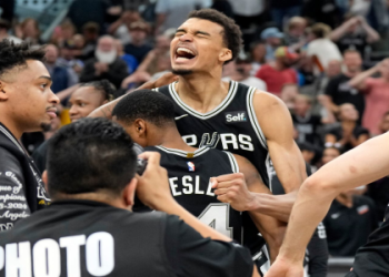 How tall are Wembys parents and what sports did they play?