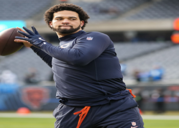 Why are NFL coaches wearing brown in the NFL? Get the simple answer explaining this interesting uniform detail.