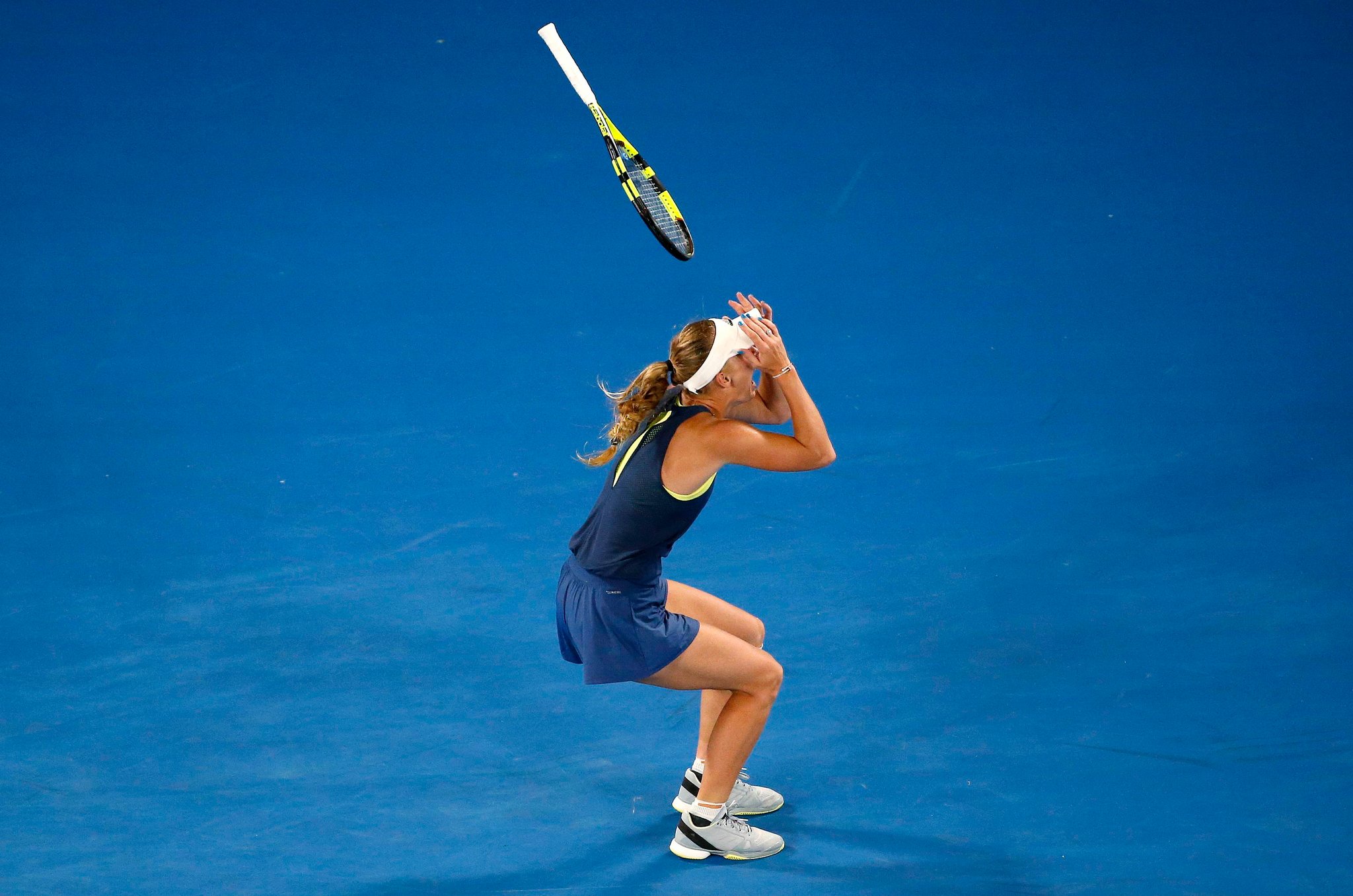 How many Grand Slams did c. wozniacki win? (Look back at her incredible Australian Open victory)